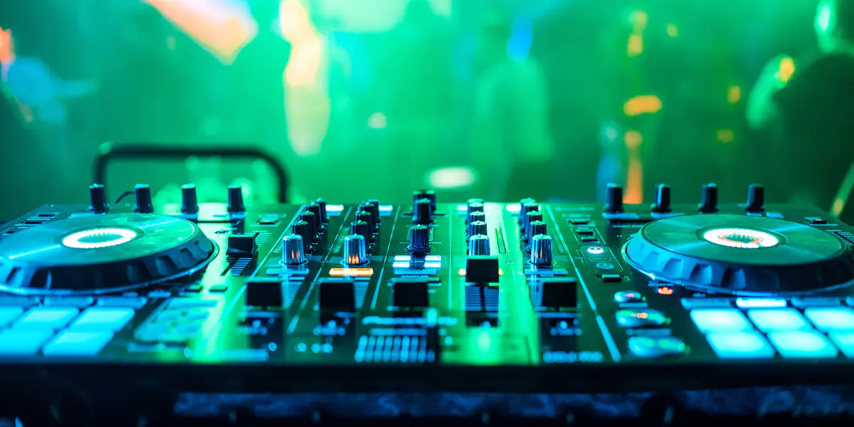 DJ controller with neon lights.